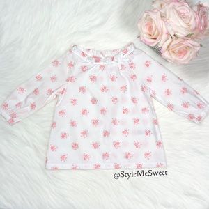 Carter’s white and pink floral shirt with bow